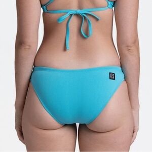jolyn andy mid rise medium to full coverage bikini bottoms in hawaii blue